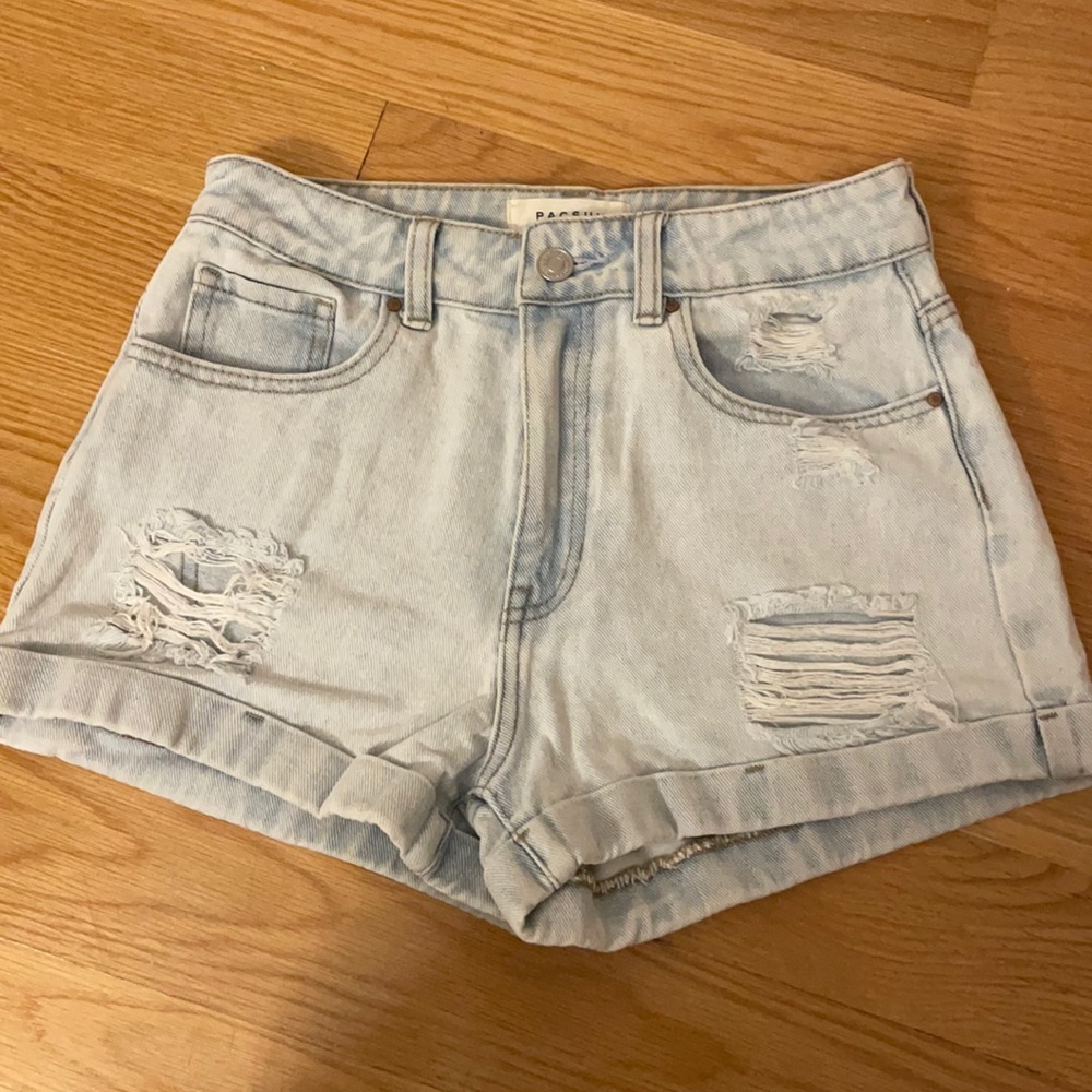 PacSun high rise denim shorts. Light blue. Distressed. Size 24. Would fit 24–25